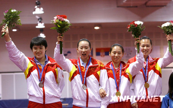 7月9日，中国选手戴宁阳、蔡姗姗、刘娟、马越斐（从右至左）在领奖台上。当日，在贝尔格莱德举行的第25届世界大学生运动会乒乓球女子双打决赛中，蔡姗姗/戴宁阳以4比3战胜队友刘娟/马越斐，夺得冠军。